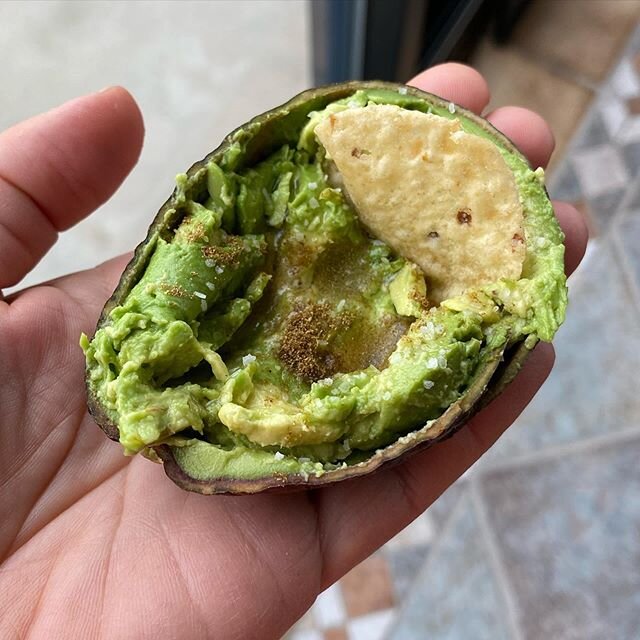 WFH pro tip:  too lazy to use dishes?  Make your avocado toast topping right in the skin and dip chips or toast into it.... #wfh #quarantine #corona #lunch #avocado