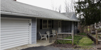  Much larger than it looks! Over 2100 square feet on 2 acres with an in-law apartment. 