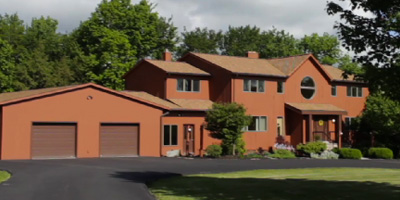  A spacious country estate with rolling lawns, pool, pond, and over 6500 top-of-the-line square feet of living space. 