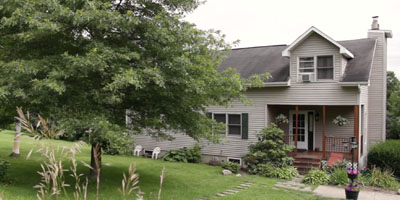 A spacious country home on over 7 acres, with beautiful spaces to relax and enjoy the outdoors!