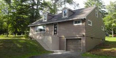 A spacious and updated home on over an acre just a couple minutes into the country.