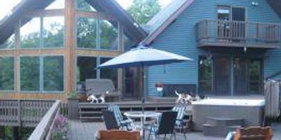 A beautiful and unique Contemporary home or getaway on 2 acres near the Whitney Point reservoir .