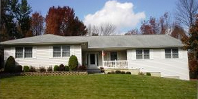 A large, newer sprawling Ranch on a cul-de-sac.