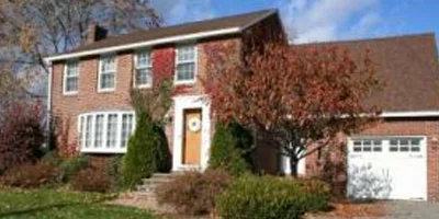 A stately brick 2-story with a gourmet kitchen in the heart of Chenango Bridge