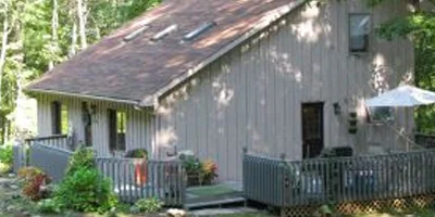 A perfect, hidden country Contemporary just up the hill from the village of Owego.