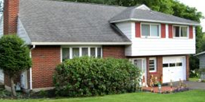 Deceptively large split-level home with many updates.