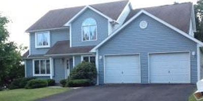 A beautiful, and large, contemporary on a corner lot with a flexible layout.