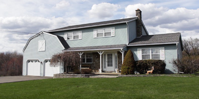 A pristine one-owner country home with a barn.