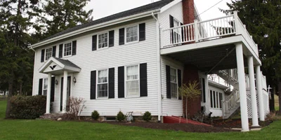 A historically beautiful, impeccably maintained and updated, country home with 50 pastoral acres and a barn.