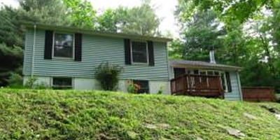 A lovely split level home on over 2 acres in beautiful country seclusion.