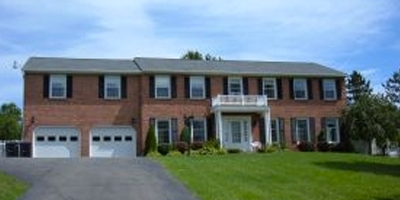 A huge brick home on over 23 acres. In-law apartment.