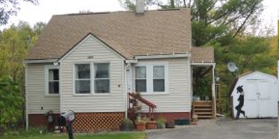 Easy to care for home with newer roof on almost 3 acres in the heart of Vestal.
