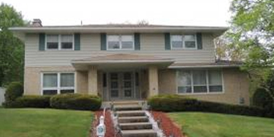 Solidly-built home on a corner lot with large bedrooms and a newer gourmet kitchen.