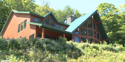 A spectacular Contemporary overlooking the Whitney Point Reservoir.