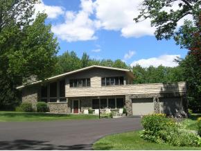 A unique custom-built split-level with gorgeous spaces.