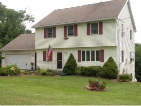 A 1-owner country home on 8 acres near Chenango Valley State Park.