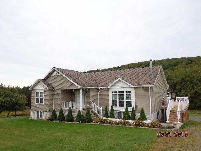 A beautiful custom-built one-owner home just a couple miles from Onetona.