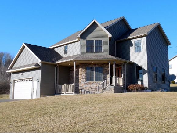 An exceptional home full of luxury amenities on a corner lot. 2 master suites and over 4300 square feet.