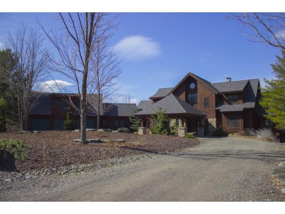 A spectacular estate featuring a unique newer home set on over 25 acres with 3 ponds.