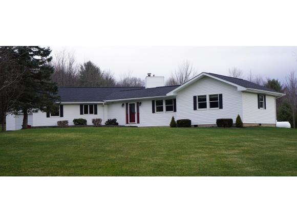 An updated and expanded Ranch on 2.5 acres.