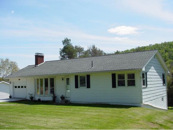 A full updated and renovated Ranch on a scenic acre.