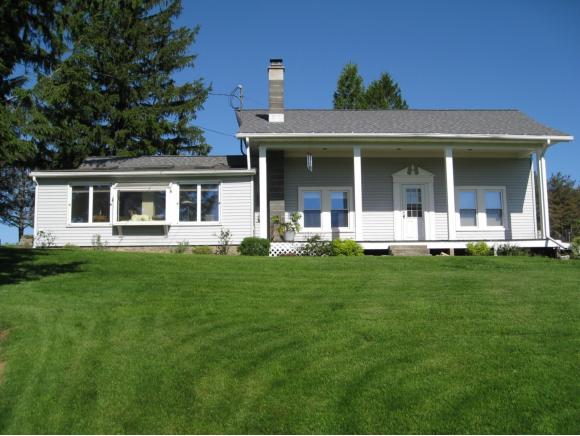 A unique country property featuring a fully renovated home along with 2 great outbuildings