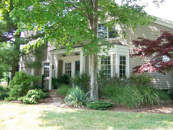 A beautiful, spacious newer Townhouse with cultivated gardens.