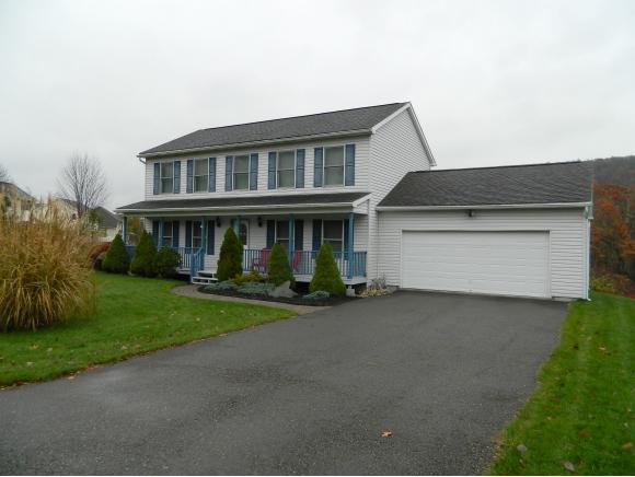 A spacious newer home in a beautiful setting.