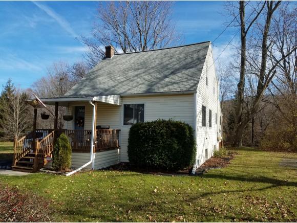 A spacious Cape Cod on an double lot.