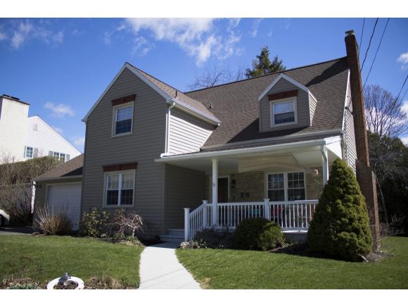 A stately 2-story on the West Side featuring newer roof, windows, kitchen, and many other updates.