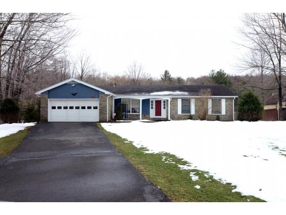 A lovely Ranch with over 2400sq' set on 1.4 acres.