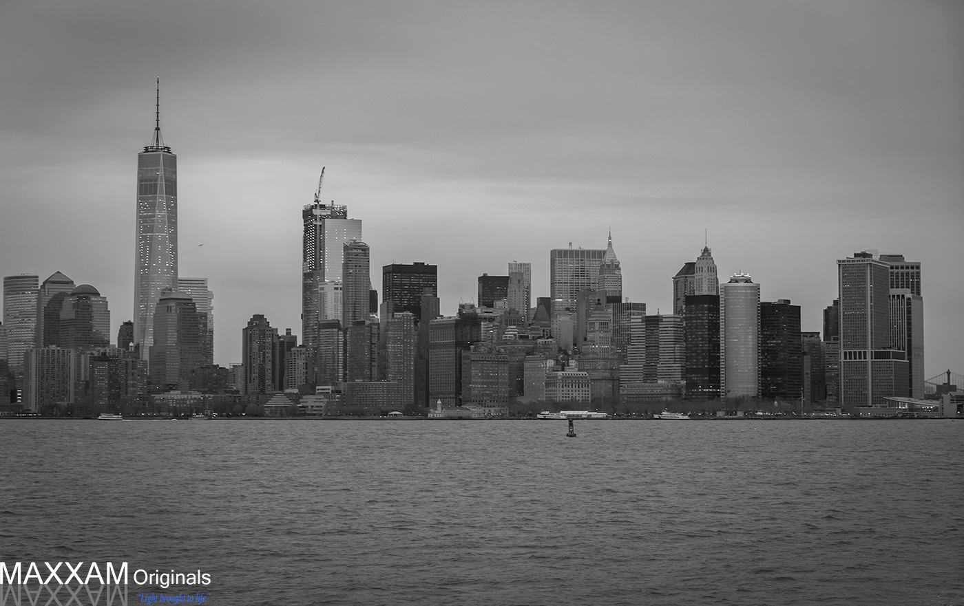 The single Freedom Tower stands alone while it's twin awaits it's turn to be built.