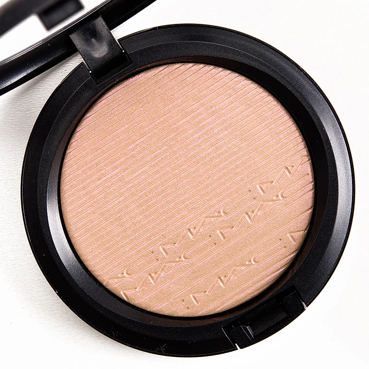 Mac Highlighter in Oh Darling - £25.50 Extra Dimension Skinfinish adds the perfect glow to skin. The liquid-powder highlighter, with prismatic reflections, is designed to sculpt and highlight your face, leaving a luminous, well-defined finish. The creamy powder formula lasts up to ten hours.