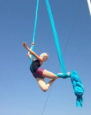 Meg Crosbie working on her aerial silks