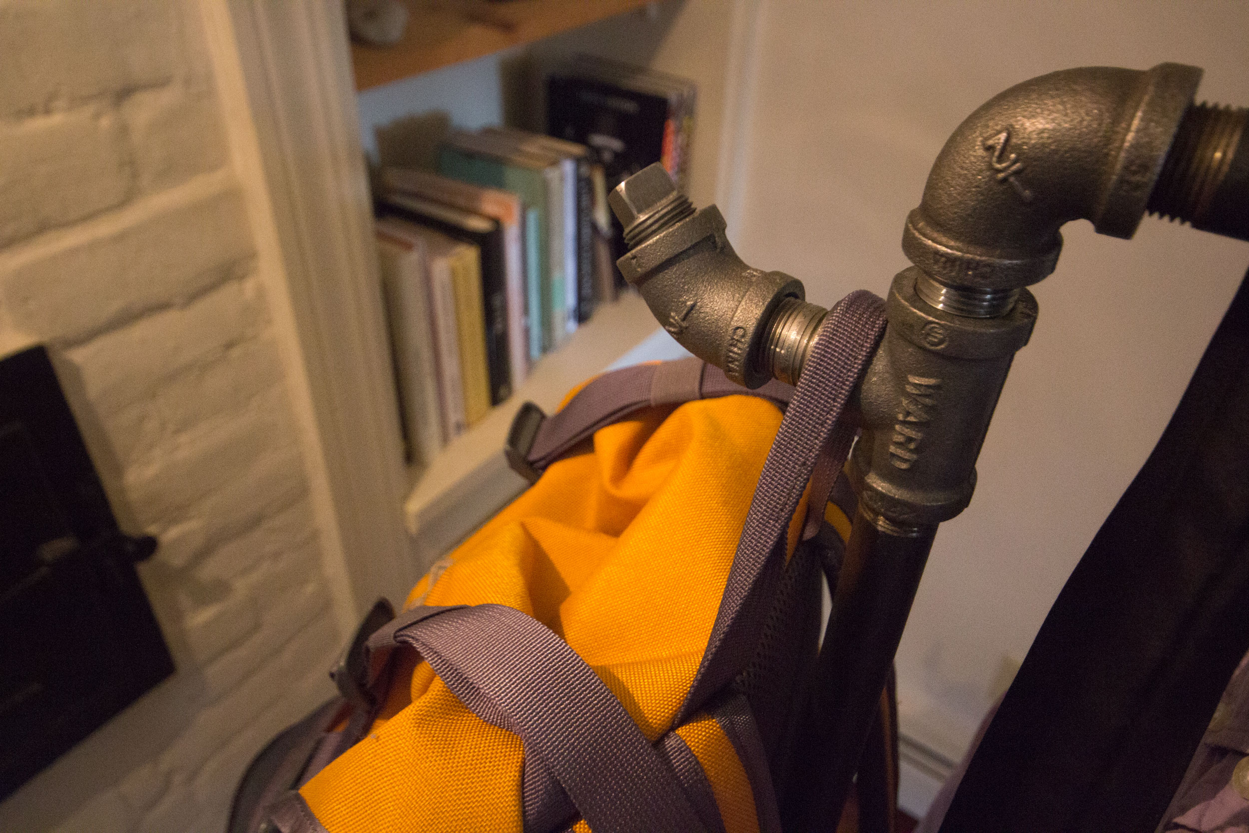 Side hooks provide convenient places to hang bags and coats.