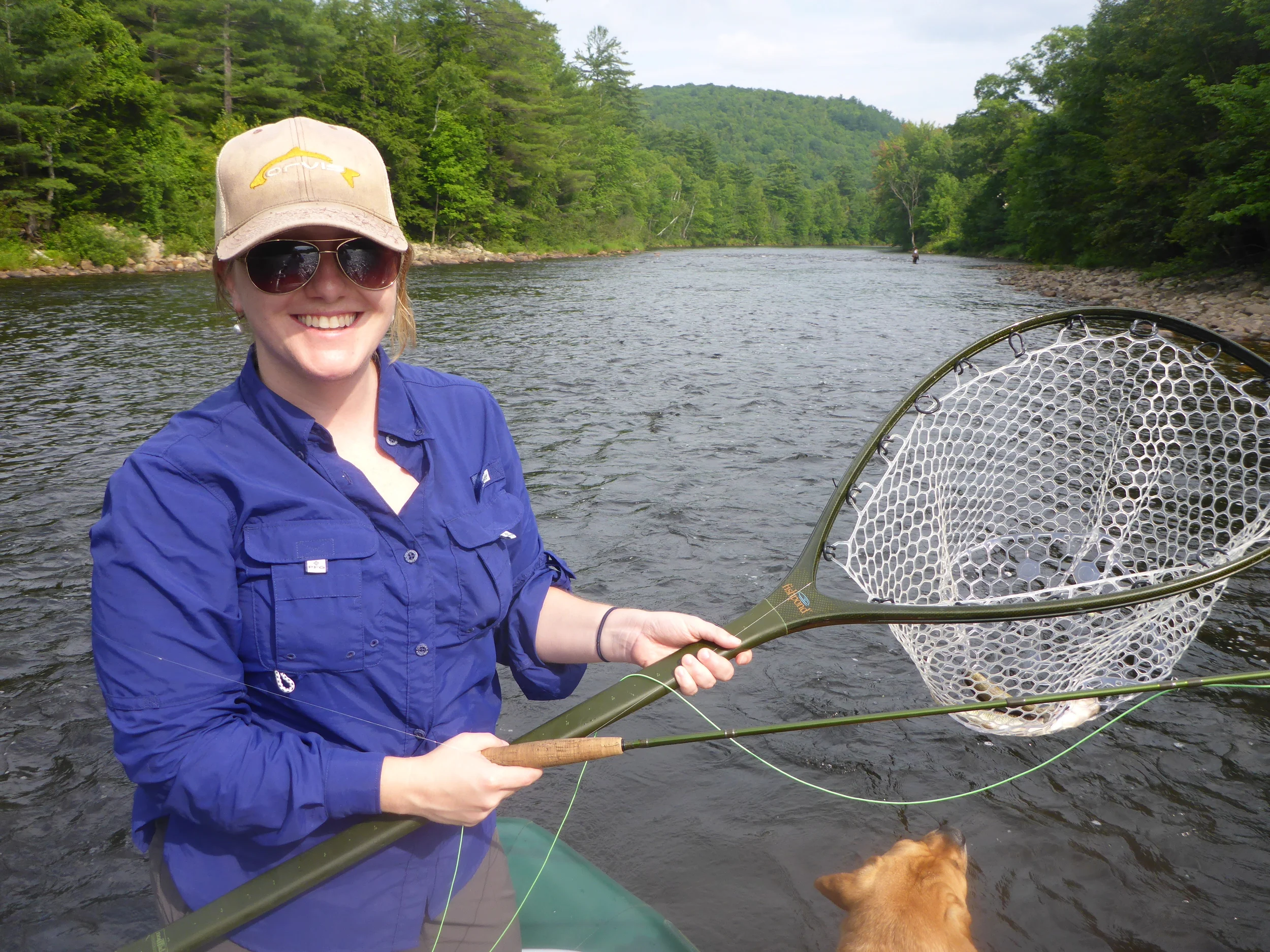 Alicia with her first rainbow...(there is also a Fallfish in the net that I hooked at the same time.