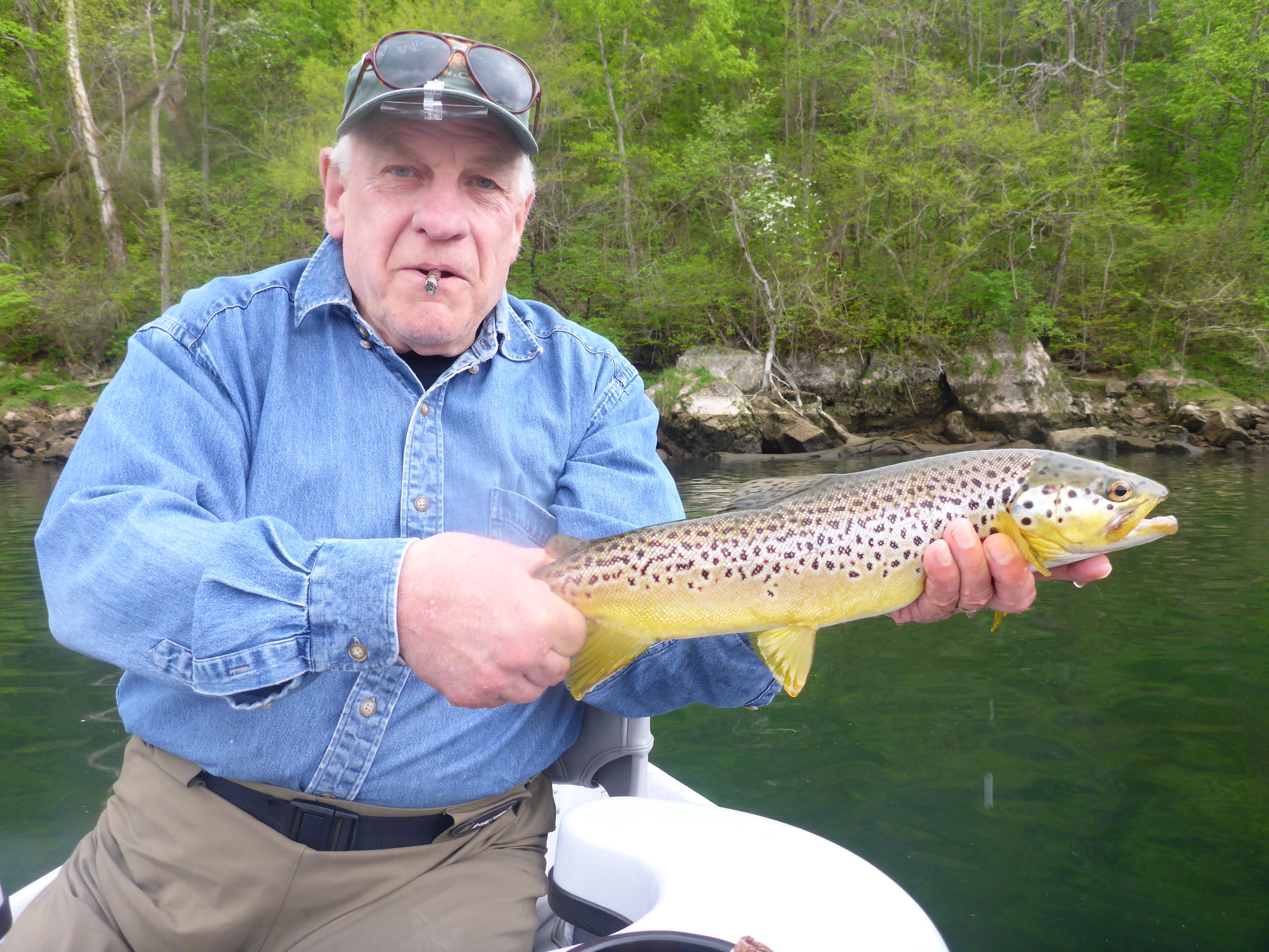 A happy customer with a 20" brown caught on a size 20 midge. 