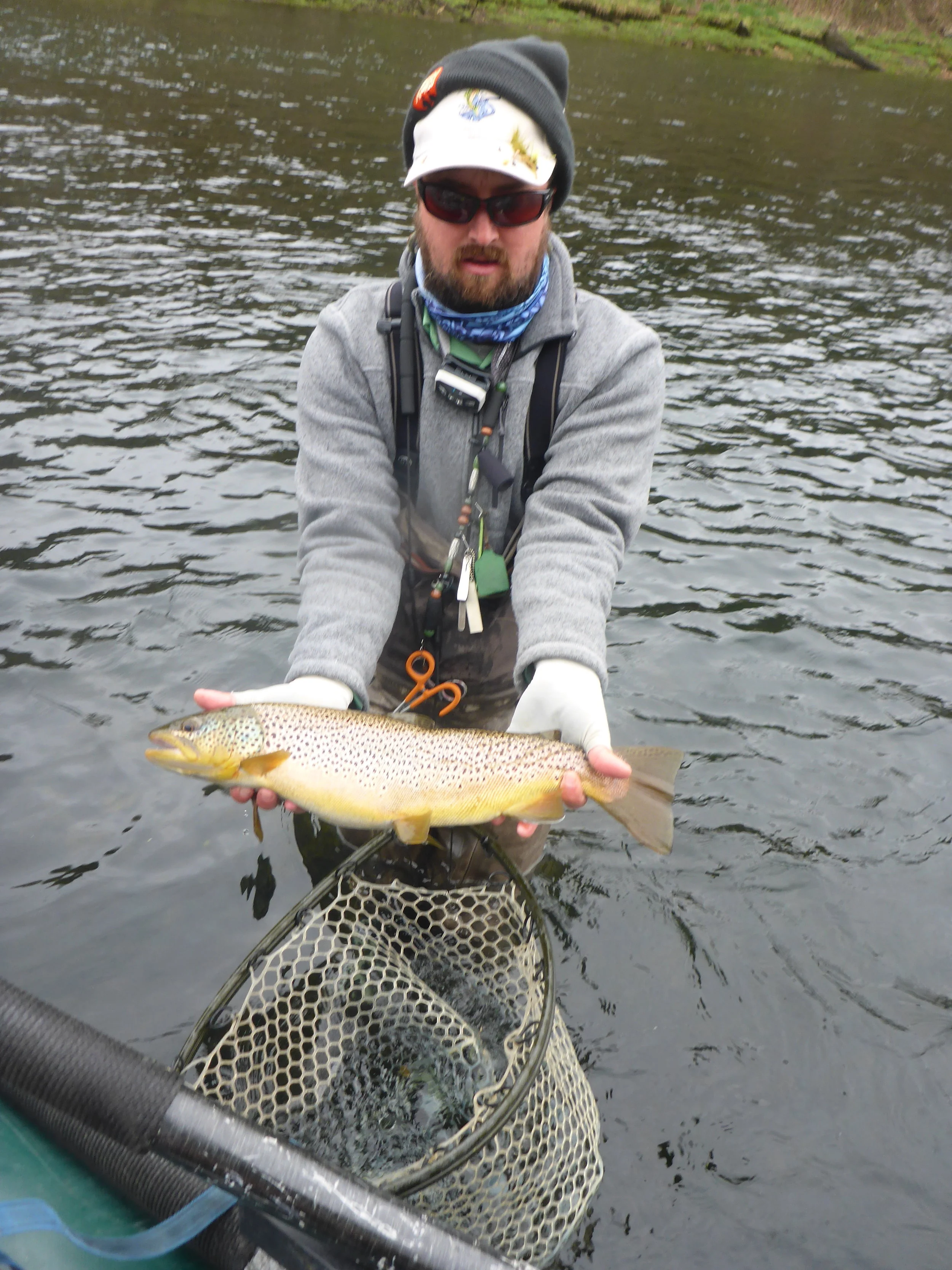 Jeff Smith landed this impressively fat 20" brown on a size 16 hares ear nymph. (here a hares ear nymph makes for a perfect caddis pupa imitation)