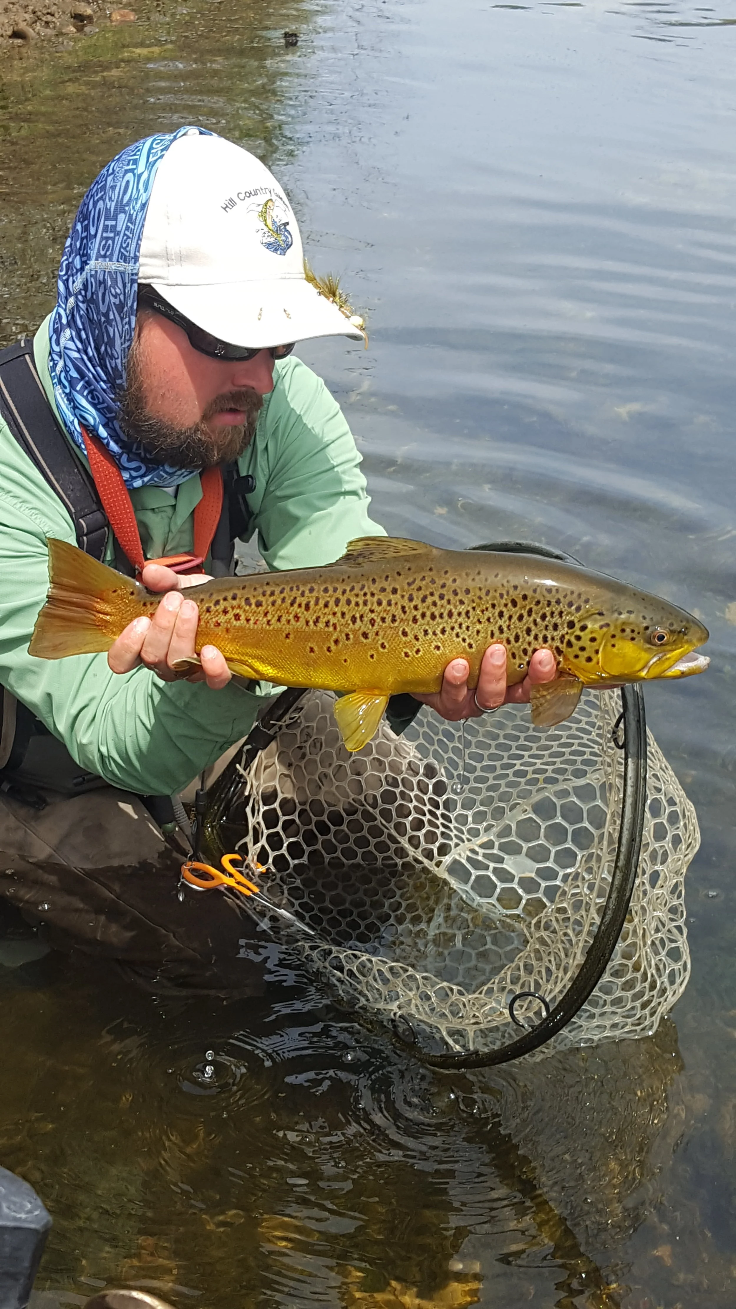 Nate Hill with one of many brown trout caught while fishing with Jeremy Hunt. 