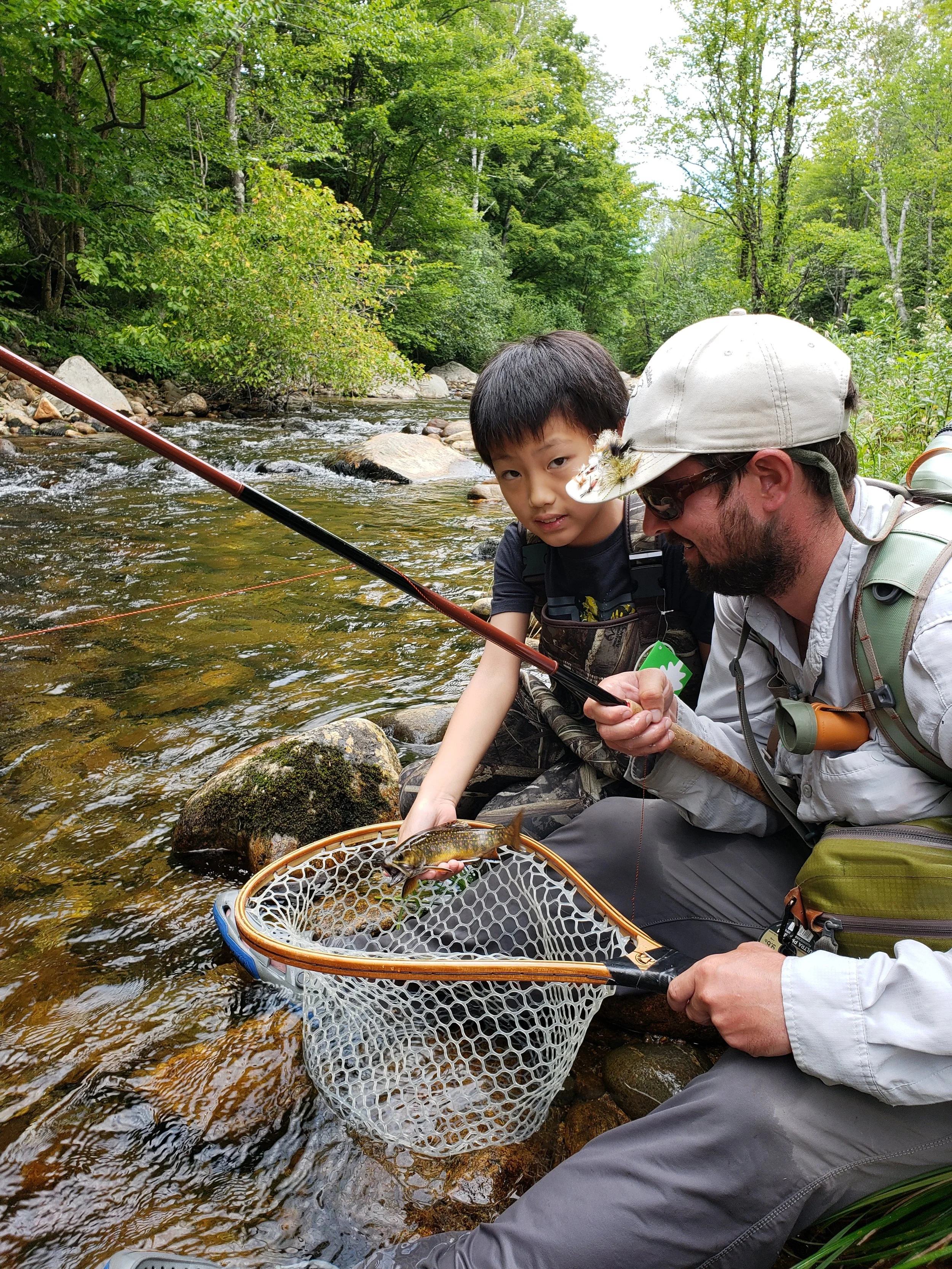 Hayden's first trout on the fly was a Buck wild brookie that ate an Elk Hair Caddis skaded using a Red brook Tenkara Rod. 