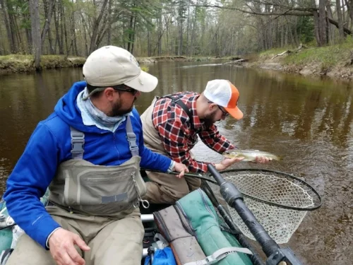 Charlie with a Salmon that ate a Drunk and Disorderly streamer right of the bank! 