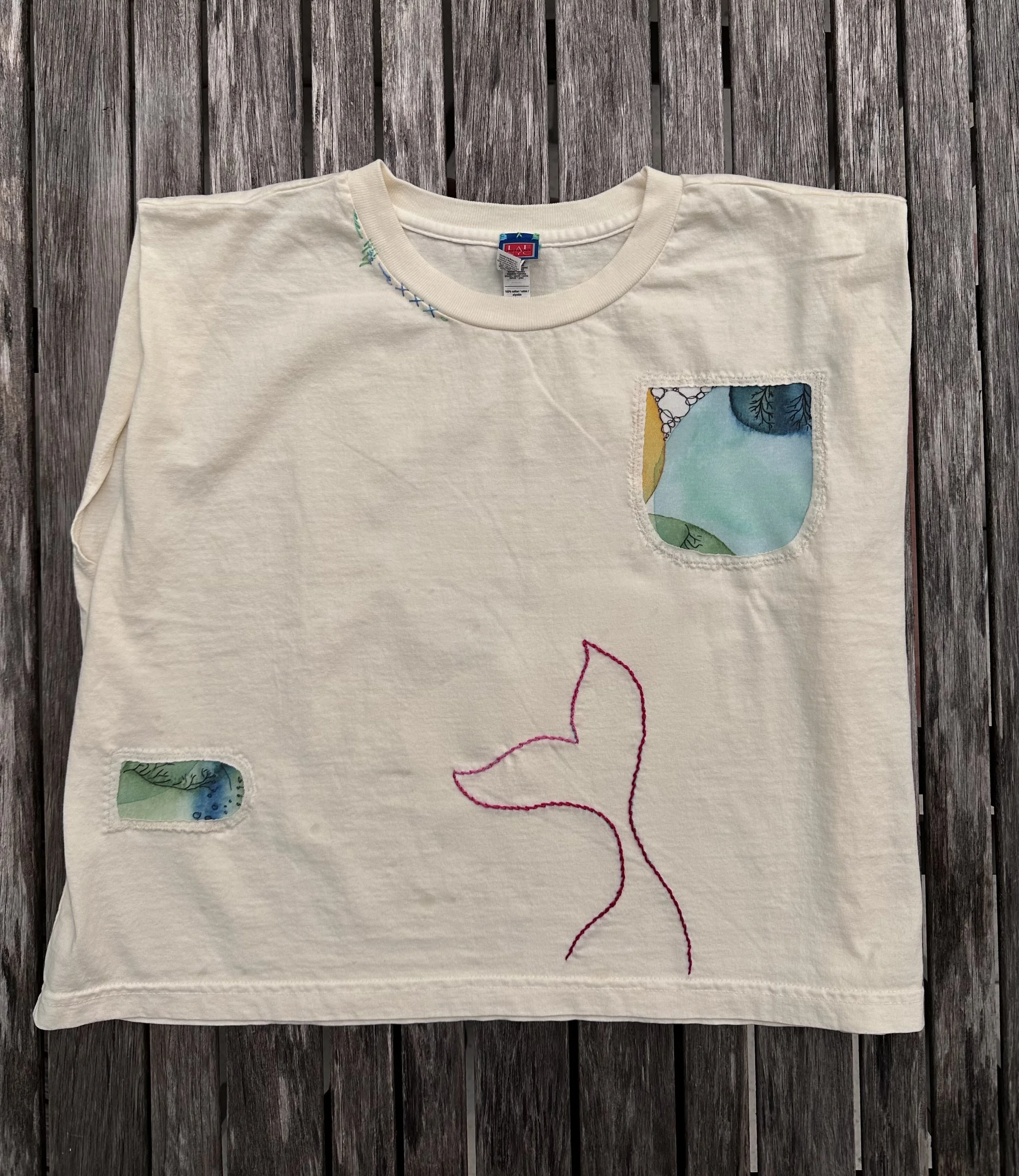 LAF_Designs_TEE-SEA-CRM_front_tail.jpeg