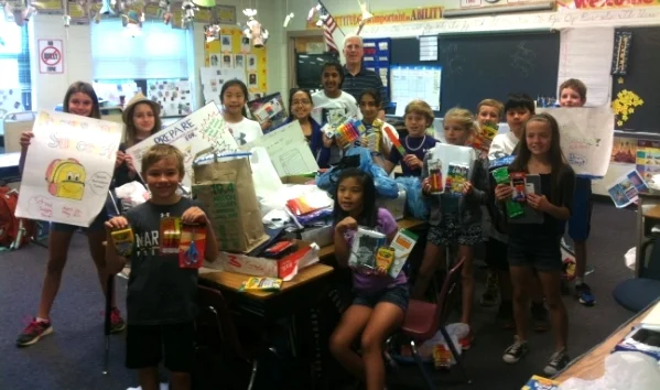 The Fulton Elementary Student Council presents Mr. Roy
Normal
0
false
false
false
EN-US
X-NONE
X-NONE
MicrosoftInternetExplorer4
Appletree, Prepare for Success, a "trunk full" of donated school supplies.
