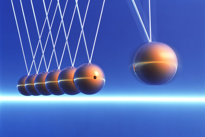 Newton's Cradle in Motion