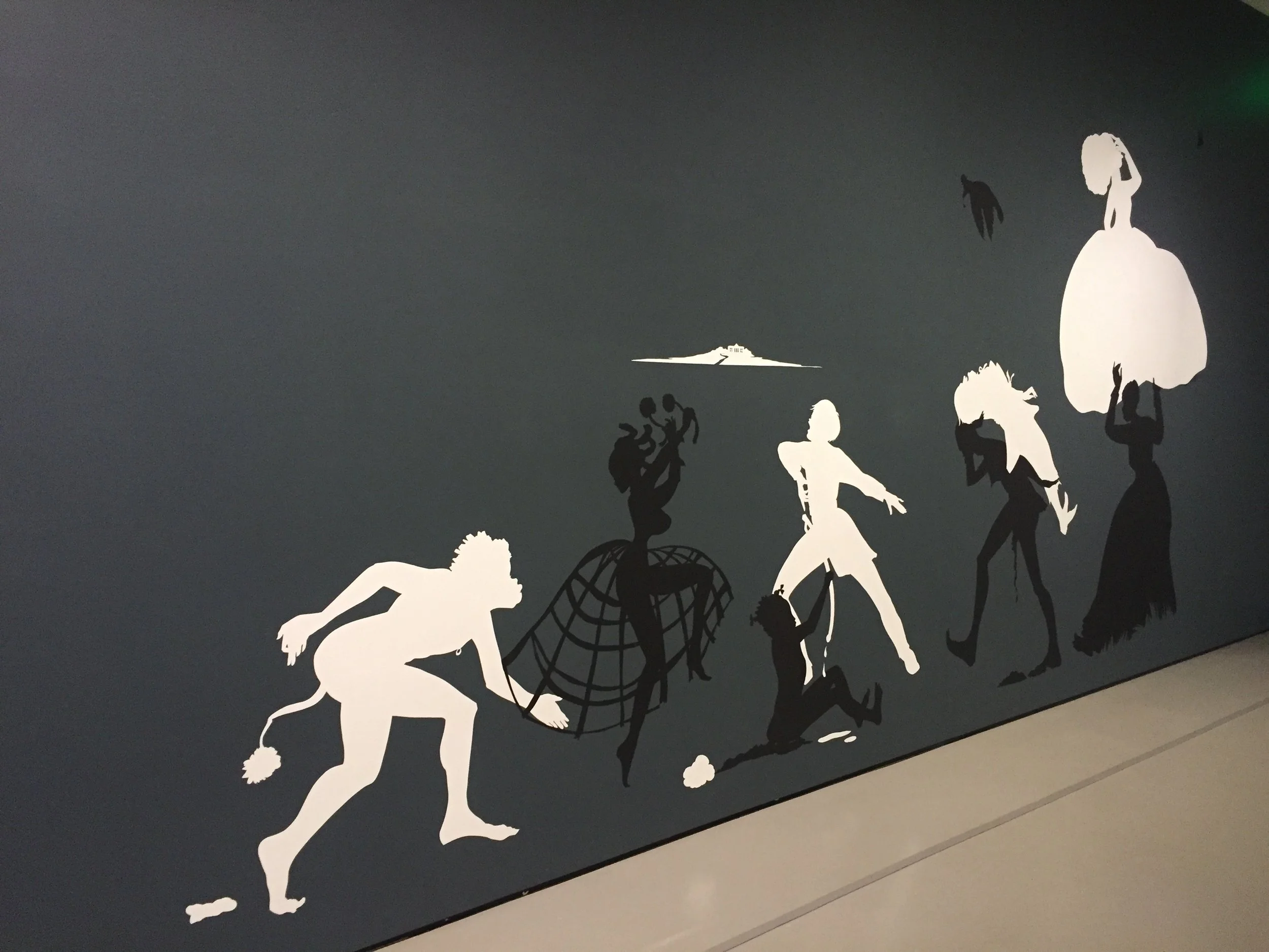 Kara Walker,&nbsp;The Rich Soil Down There,&nbsp;2002, Cut paper and adhesive on painted wall