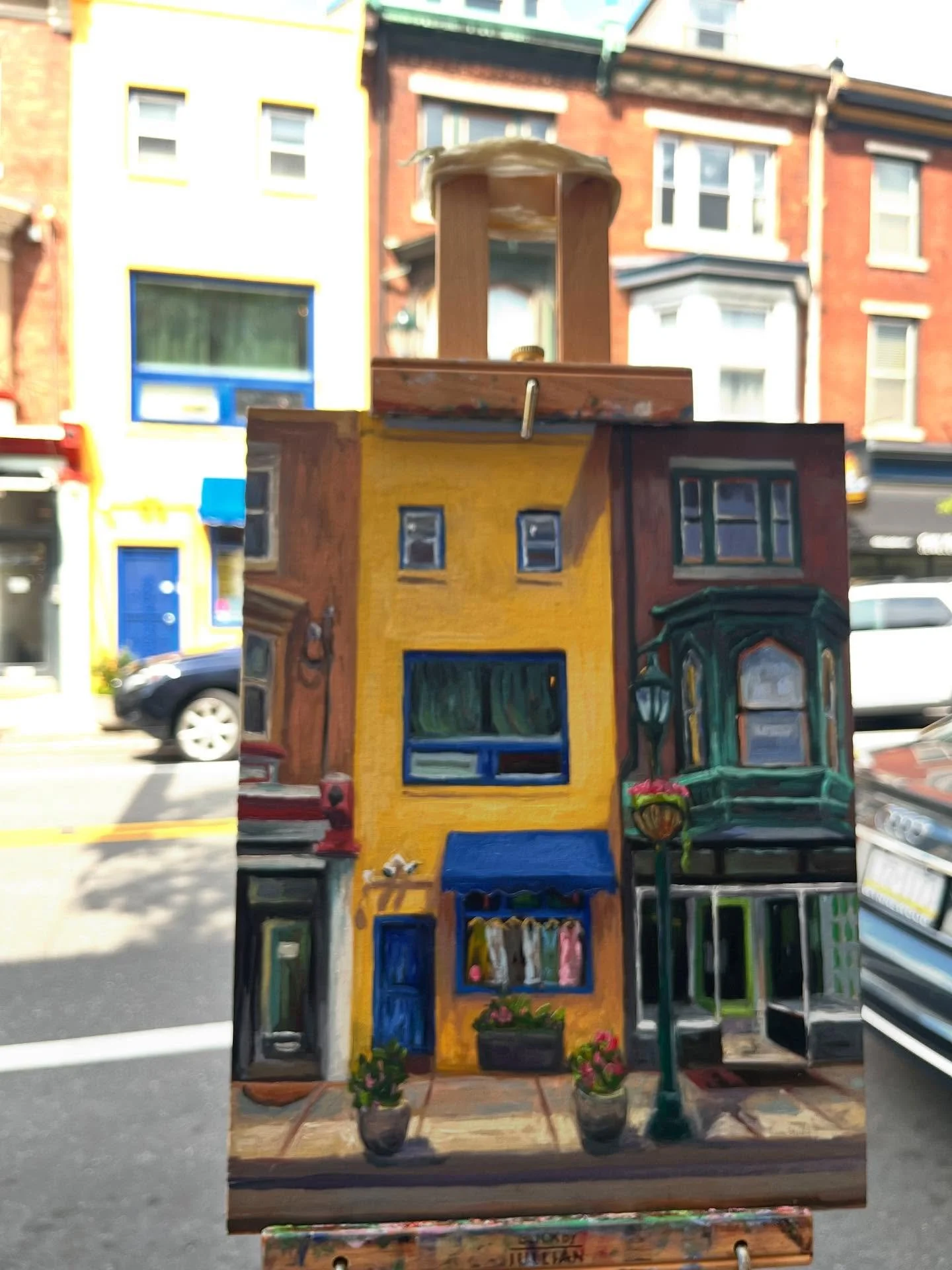 The Manayunk laughing face building is complete. #manayunkphilly #pleinairpainting #oilpainting #oiloncanvaspainting #urbanpainters