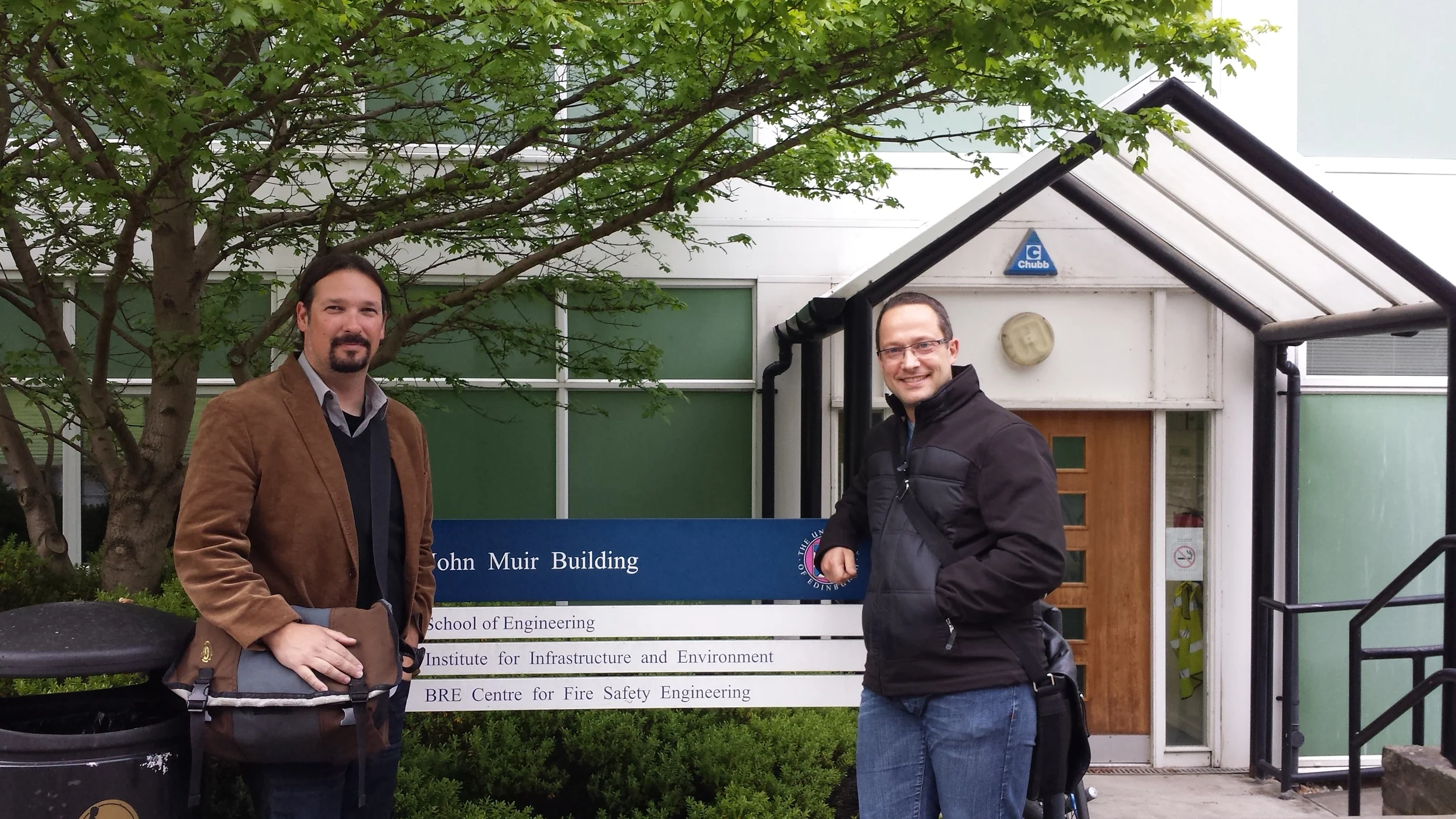 Prof. Clements (left) and Prof. Simeoni (right)  in front of the lab building at the university of Edinburgh, kings buildings. May 2015
