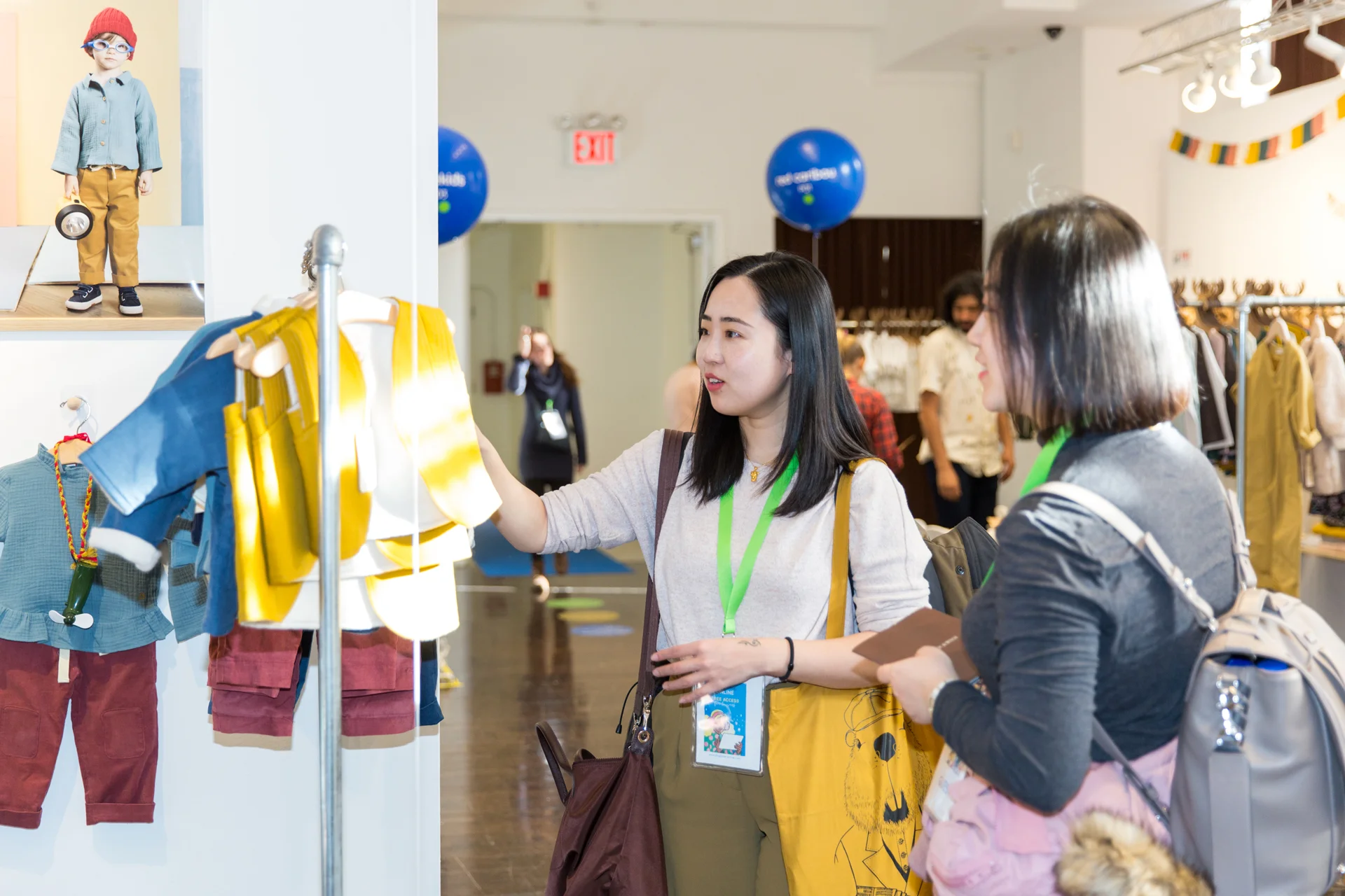 Buyers admire the Madison Frida FW19 Collection