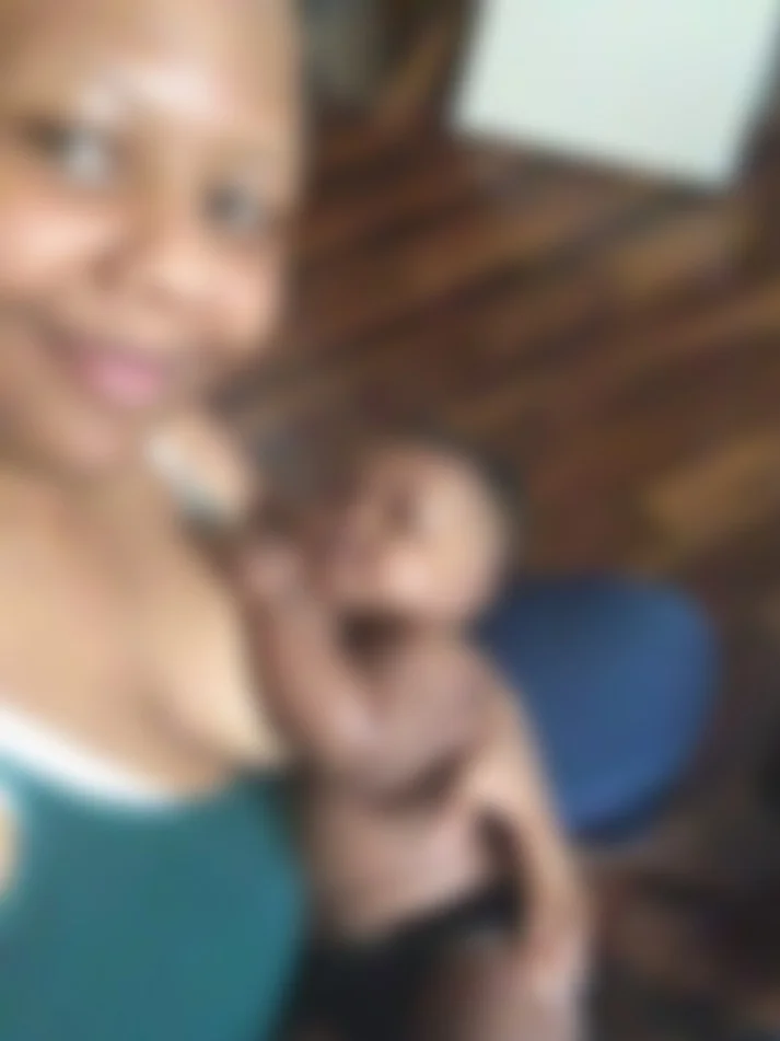 Me and my 5 month old daughter milk drunk after a feeding! Image is blurred for her privacy.