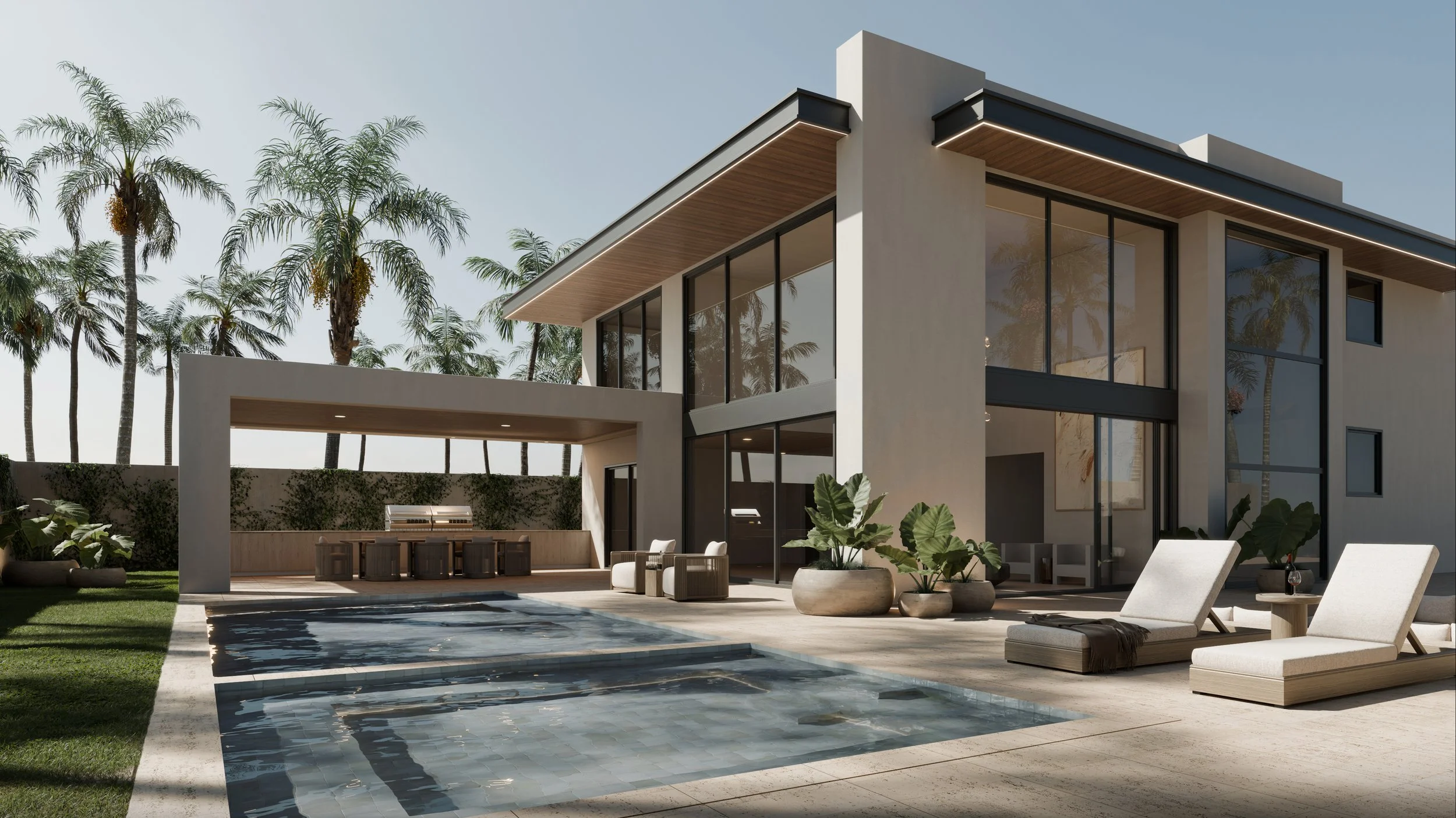 Modern house with large glass windows, outdoor seating area, lounge chairs, and a pool, surrounded by palm trees.